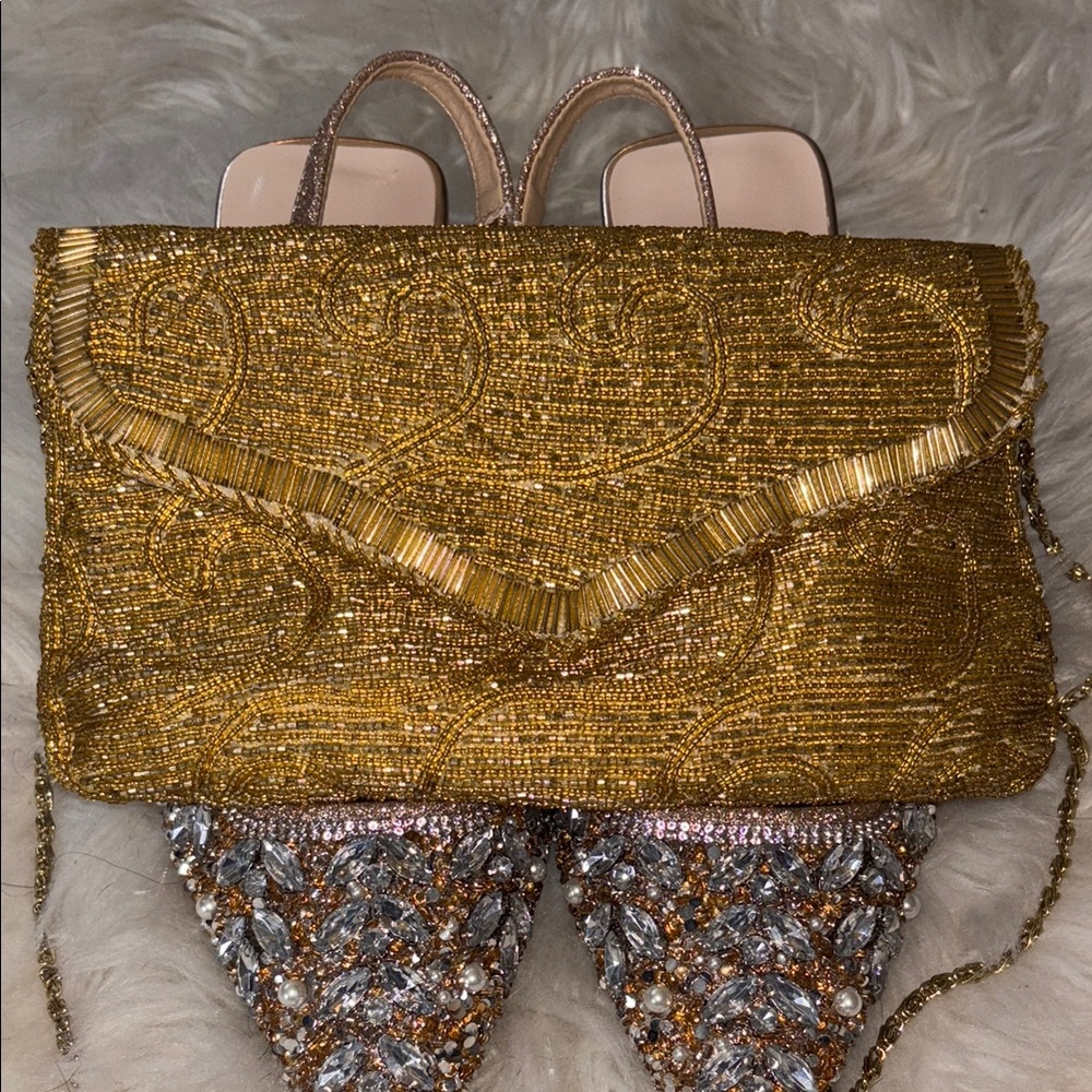 Gold Beaded Clutch by La Regale ltd.